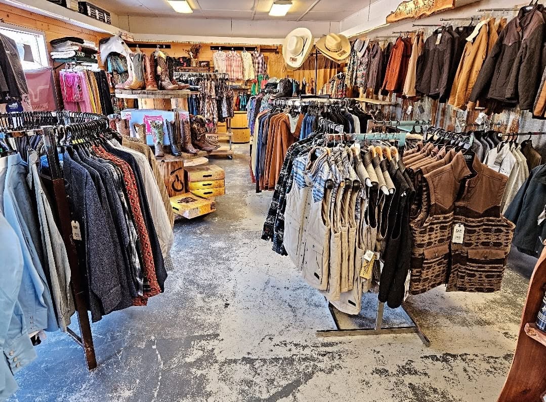 Racks of western shirts, vests and jackets inside the store